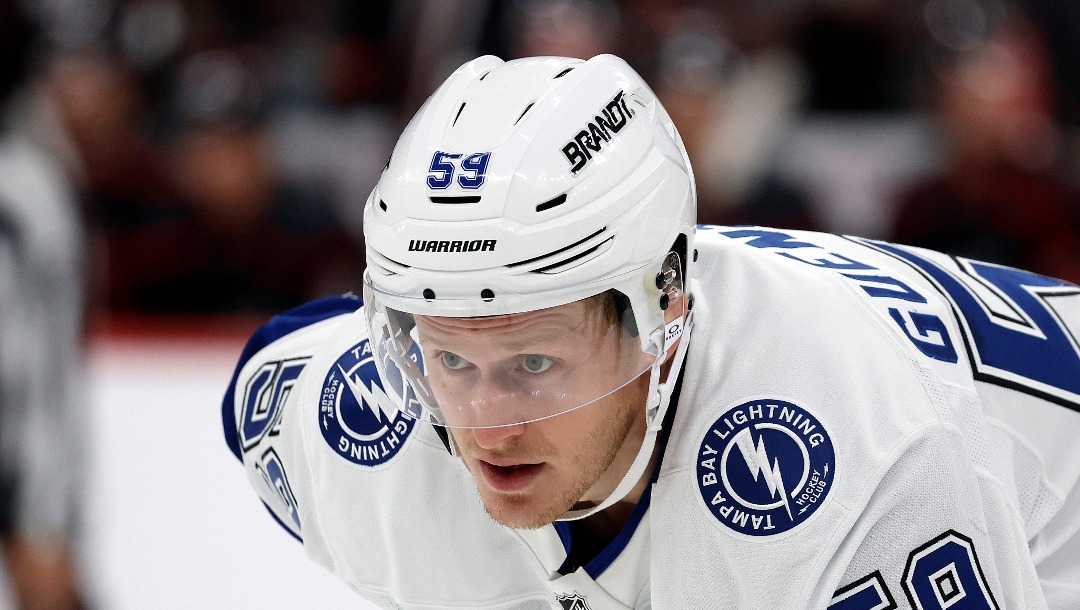 Tampa Bay Lightning's Jake Guentzel (59) watches the puck Carolina Hurricanes during the third period of an NHL hockey game in Raleigh, N.C., Friday, Oct. 11, 2024. (AP Photo/Karl B DeBlaker)