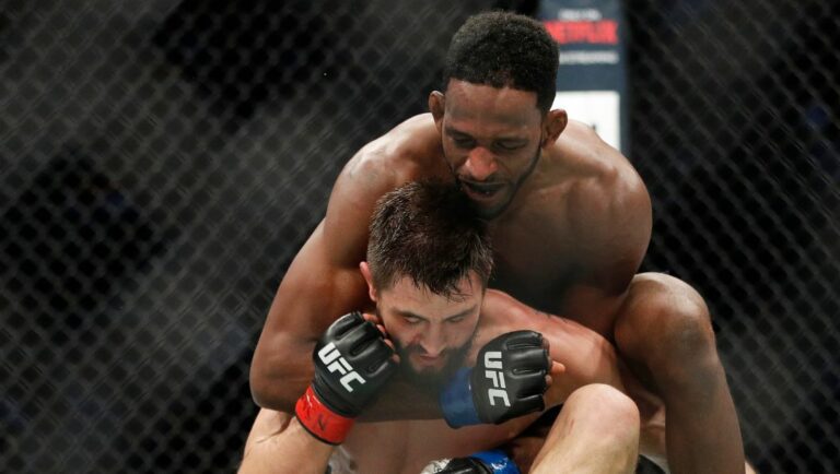 Neil Magny, right, fights Carlos Condit in a welterweight mixed martial arts bout at UFC 219, Saturday, Dec. 30, 2017.