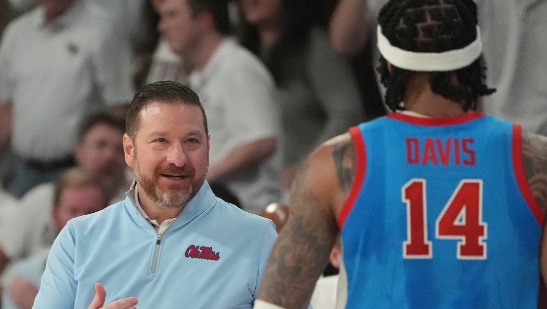 Mississippi head coach Chris Beard calls out to guard Dre Davis (14) during the second half of an NCAA college basketball game against Mississippi State, Saturday, Jan. 18, 2025, in Starkville, Miss. Mississippi State won in overtime 84-81. (AP Photo/Rogelio V. Solis)