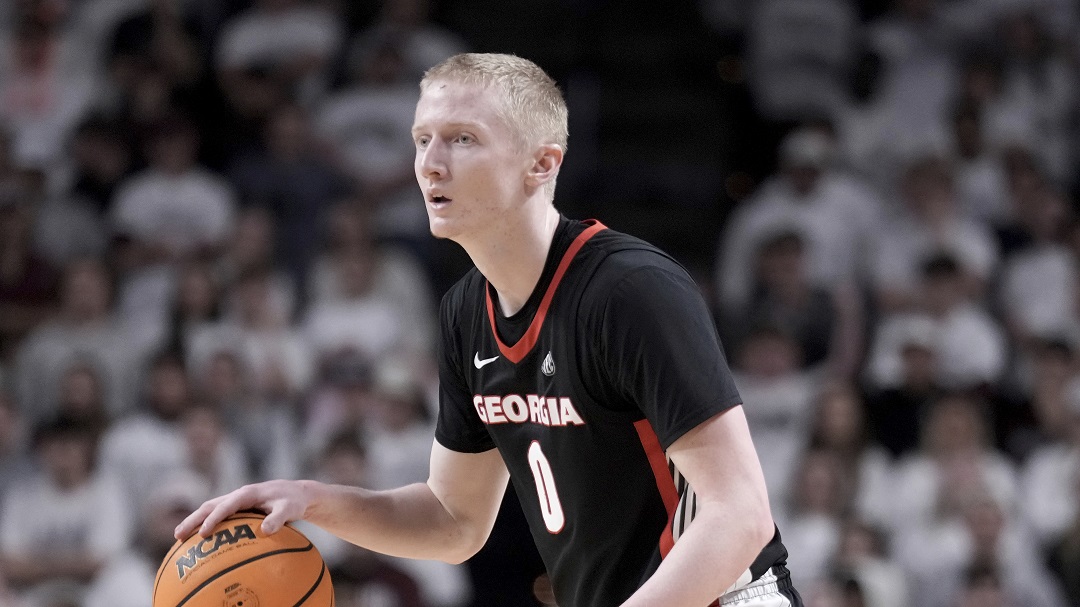 Georgia guard Blue Cain (0) looks to pass against Texas A&M during the second half of an NCAA college basketball game Tuesday, Feb. 11, 2025, in College Station, Texas.