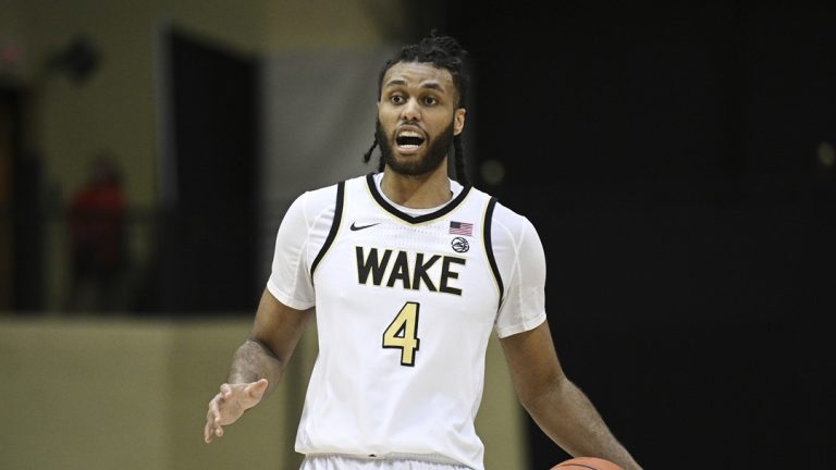 Wake Forest forward Efton Reid III (4) brings the ball up the court against Florida during the first half of an NCAA college basketball game, Thursday, Nov. 28, 2024, in Kissimmee, Fla.