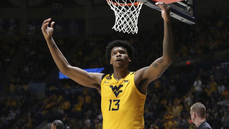 West Virginia forward Amani Hansberry (13) reacts during the second half of an NCAA college basketball game against Houston Wednesday, Jan. 29, 2025, in Morgantown, W.Va.