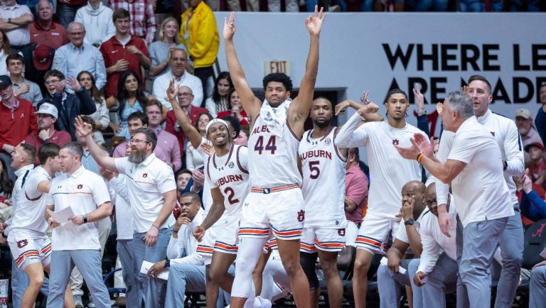 Auburn reacts to a three-point shot in a run against Alabama during the second half of an NCAA college basketball game, Saturday, Feb. 15, 2025, in Tuscaloosa, Ala.