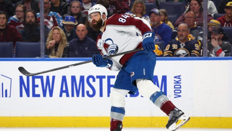 Colorado Avalanche defenseman Brent Burns (84) passes the puck during the first period of an NHL hockey game against the Buffalo Sabres Monday, Oct. 13, 2025, in Buffalo, N.Y.