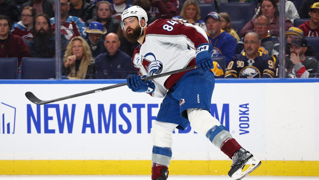 Colorado Avalanche defenseman Brent Burns (84) passes the puck during the first period of an NHL hockey game against the Buffalo Sabres Monday, Oct. 13, 2025, in Buffalo, N.Y.