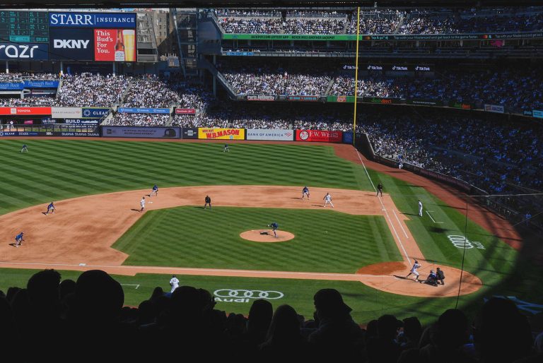 Starting pitcher throws to a batter at Yankee stadium