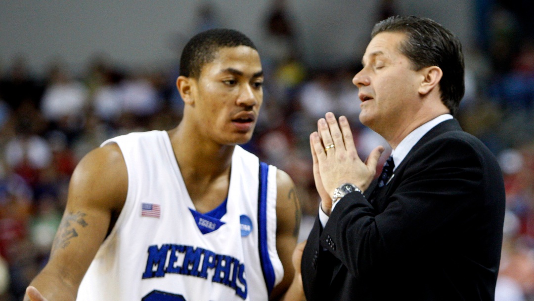 Memphis coach John Calipari talks to Memphis guard Derrick Rose (23) during a time out during a game against Mississippi State in the first half of an NCAA men's basketball second-round South Regional game, Sunday, March 23, 2008, in North Little Rock, Ark. (AP Photo/Sue Ogrocki)