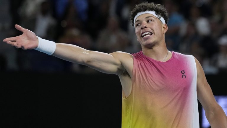 Ben Shelton of the U.S. reacts during his semifinal match against Jannik Sinner of Italy at the Australian Open tennis championship in Melbourne, Australia, Friday, Jan. 24, 2025.