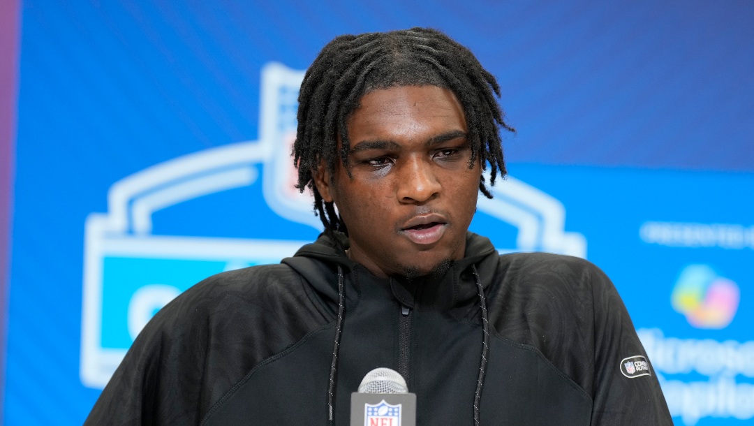 Miami quarterback Cam Ward speaks during a press conference at the NFL football scouting combine Friday, Feb. 28, 2025, in Indianapolis. (AP Photo/George Walker IV)