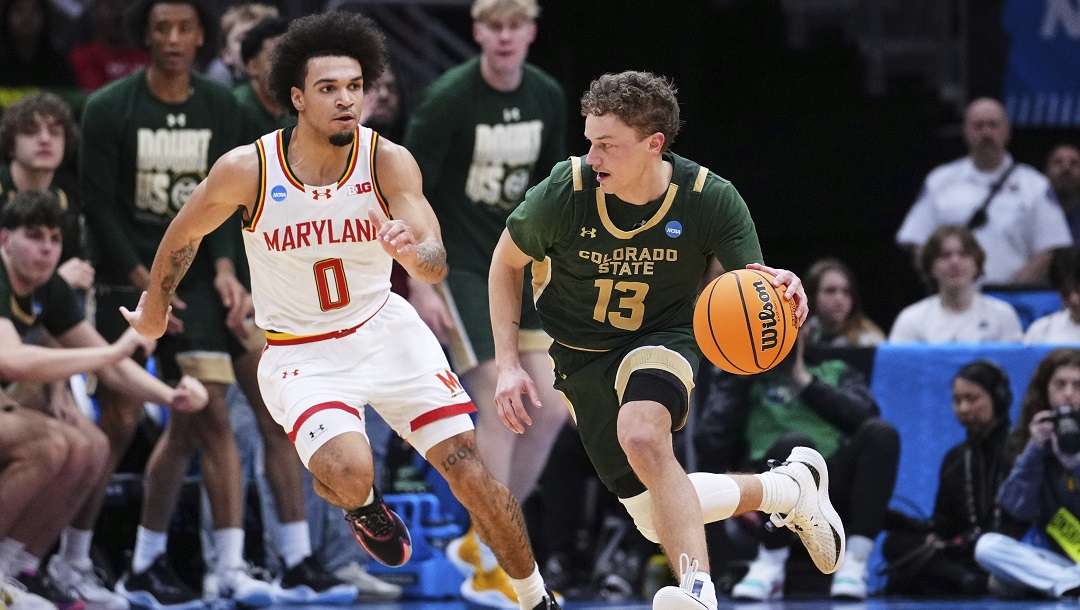 Colorado State guard Bowen Born (13) drives against Maryland guard Ja'Kobi Gillespie (0) during the first half in the second round of the NCAA college basketball tournament Sunday, March 23, 2025, in Seattle.