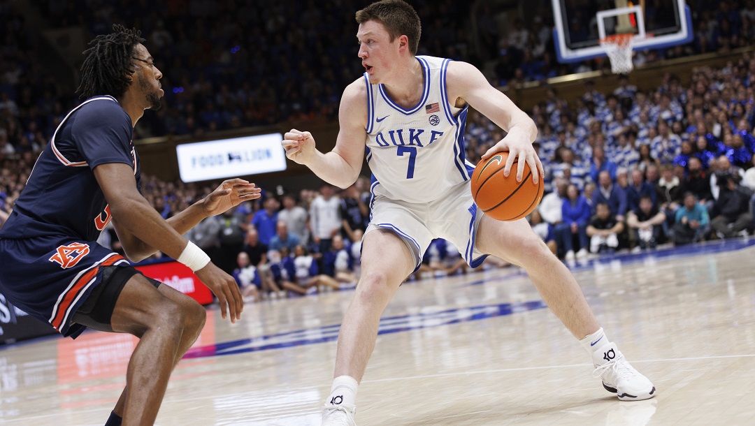 Duke's Kon Knueppel (7) handles the ball during an NCAA college basketball game in Durham, N.C., Wednesday, Dec. 4, 2024.