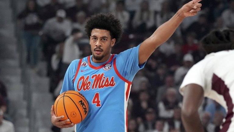 Mississippi forward Jaemyn Brakefield (4) directs his teammates during the first half of an NCAA college basketball game against Mississippi State, Saturday, Jan. 18, 2025, in Starkville, Miss. Mississippi State won 85-81.