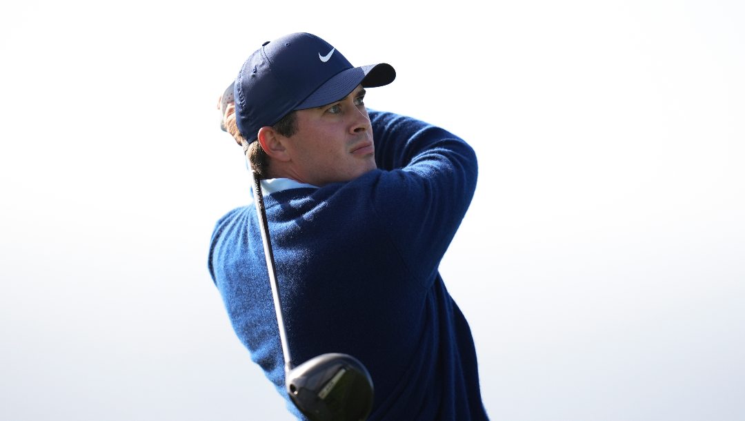 Davis Thompson hits a tee shot on the 17th hole of the South Course at Torrey Pines during the second round of the Genesis Invitational golf tournament Friday, Feb. 14, 2025, in San Diego.