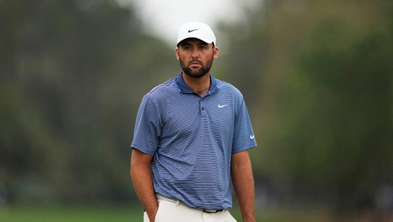 Scottie Scheffler waits for his turn on the second hole during the final round of The Players Championship golf tournament Sunday, March 16, 2025, in Ponte Vedra Beach, Fla.