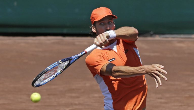 Feliciano Lopez, of Spain, returns a shot to Juan Monaco, of Argentina, in the semifinals of the U.S. Men's Clay Court Championship tennis tournament Saturday, April 9, 2016, in Houston. Monaco won 6-4, 6-2.