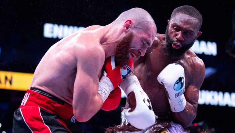 Jaron Ennis, right, in action against Karen Chukhadzhian, left, during the IBF World Welterweight title bout Saturday.