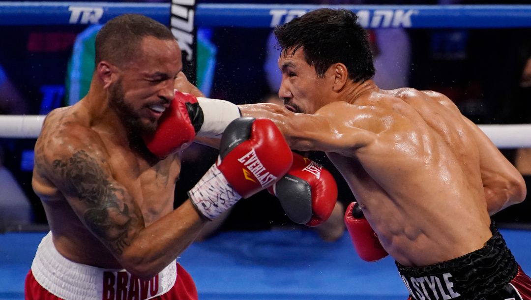Janibek Alimkhanuly, of Kazakhstan, hits Rob Brant during a middleweight boxing match Saturday, June 26, 2021, in Las Vegas.