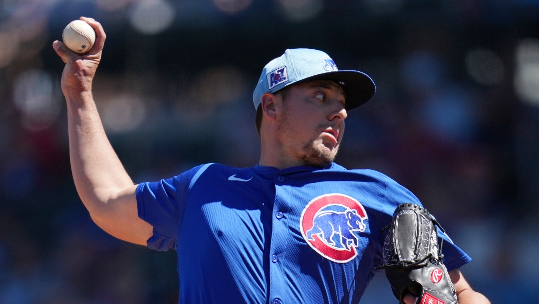 Chicago Cubs starting pitcher Brad Keller throws against the Atlanta Braves during the first inning of a spring training baseball game Monday, March 24, 2025, in Mesa, Ariz. (AP Photo/Ross D. Franklin)