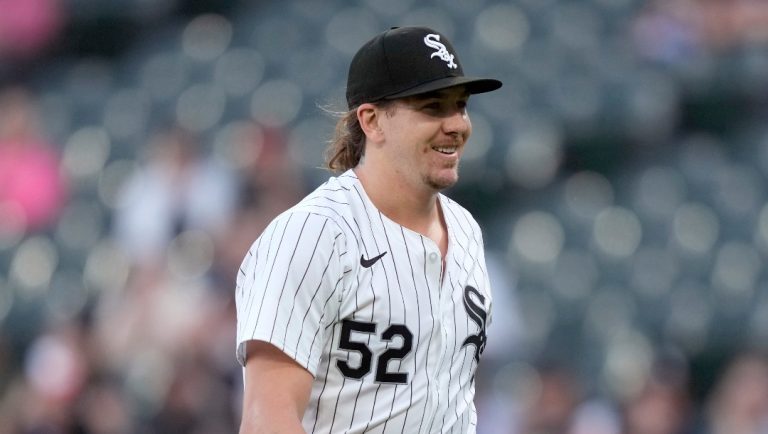 Chicago White Sox pitcher Mike Clevinger smiles after striking out Baltimore Orioles' Ryan O'Hearn to end the top of the first inning of a baseball game Thursday, May 23, 2024, in Chicago. (AP Photo/Charles Rex Arbogast)