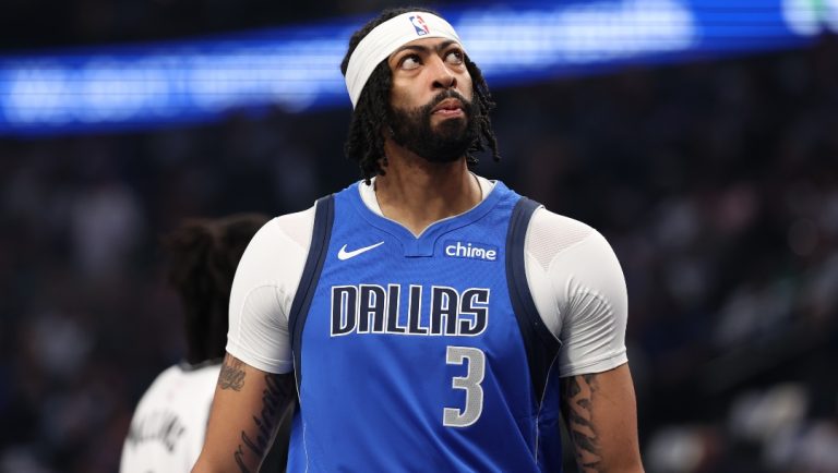 Anthony Davis #3 of the Dallas Mavericks looks on during the first half against the Brooklyn Nets at American Airlines Center on March 31, 2025 in Dallas, Texas.