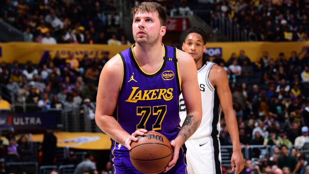 Luka Doncic #77 of the Los Angeles Lakers shoots a free throw during the game against the Los Angeles Lakers on March 17, 2025 at Crypto.Com Arena in Los Angeles, California.