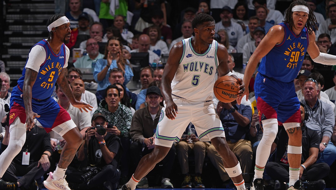 MINNEAPOLIS, MN - MAY 16: Anthony Edwards #5 of the Minnesota Timberwolves dribbles the ball during the game against the Denver Nuggets during Round 2 Game 6 of the 2024 NBA Playoffs on May 16, 2024 at Target Center in Minneapolis, Minnesota.