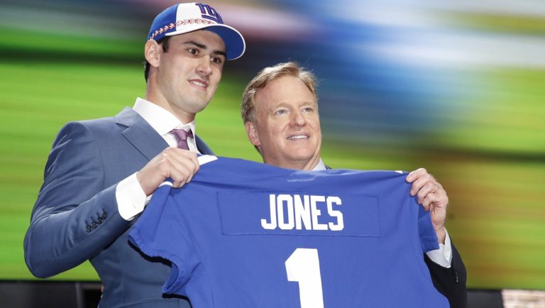 Duke quarterback Daniel Jones poses with NFL Commissioner Roger Goodell after the New York Giants selected Jones in the first round at the NFL football draft, Thursday, April 25, 2019, in Nashville, Tenn.