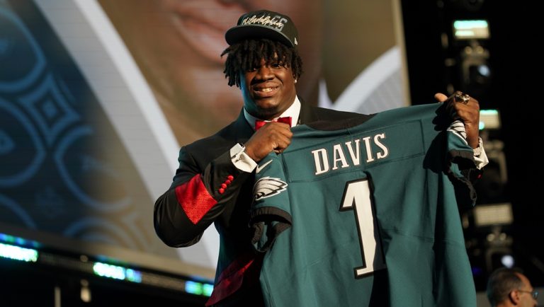 Georgia defensive tackle Jordan Davis holds a jersey after being chosen by the Philadelphia Eagles with the 13th pick of the NFL football draft Thursday, April 28, 2022, in Las Vegas.