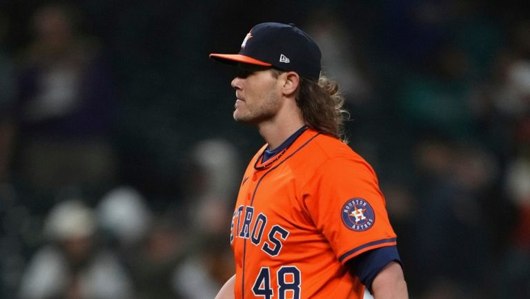 Houston Astros relief pitcher Steven Okert looks on after earning the save in a 2-1 win in the 12th inning against the Seattle Mariners in a baseball game Tuesday, April 8, 2025, in Seattle. (AP Photo/Lindsey Wasson)