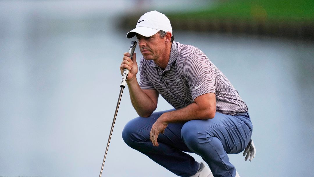 Rory McIlroy, of Northern Ireland, lines up a putt on the 18th green during the final round of The Players Championship golf tournament Sunday, March 16, 2025, in Ponte Vedra Beach, Fla.