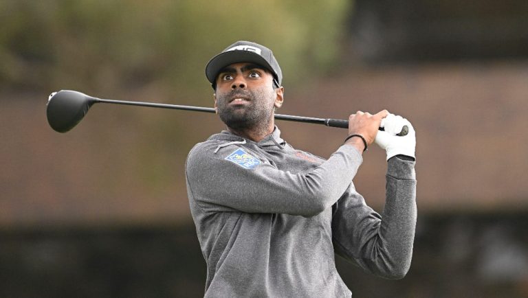 Sahith Theegala hits his tee shot on the 14th hole on the South Course at Torrey Pines during the final round of the Farmers Insurance Open golf tournament Saturday, Jan. 25, 2025, in San Diego.
