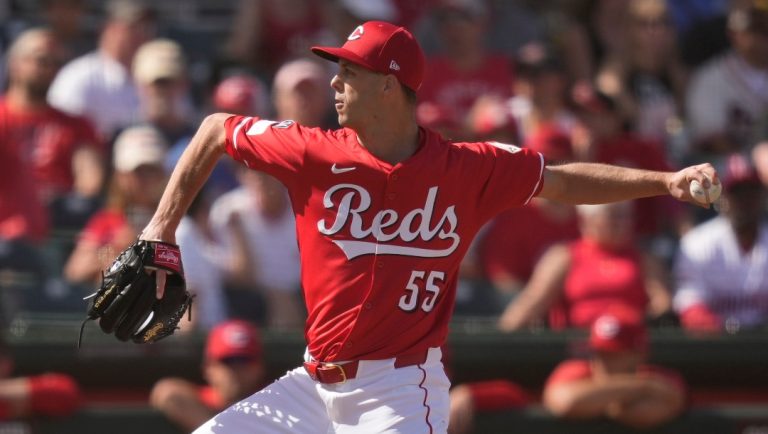 Cincinnati Reds pitcher Taylor Rogers throws during the fifth inning of a spring training baseball game against the San Diego Padres, Saturday, March, 1, 2025, in Goodyear, Ariz. (AP Photo/Carolyn Kaster)