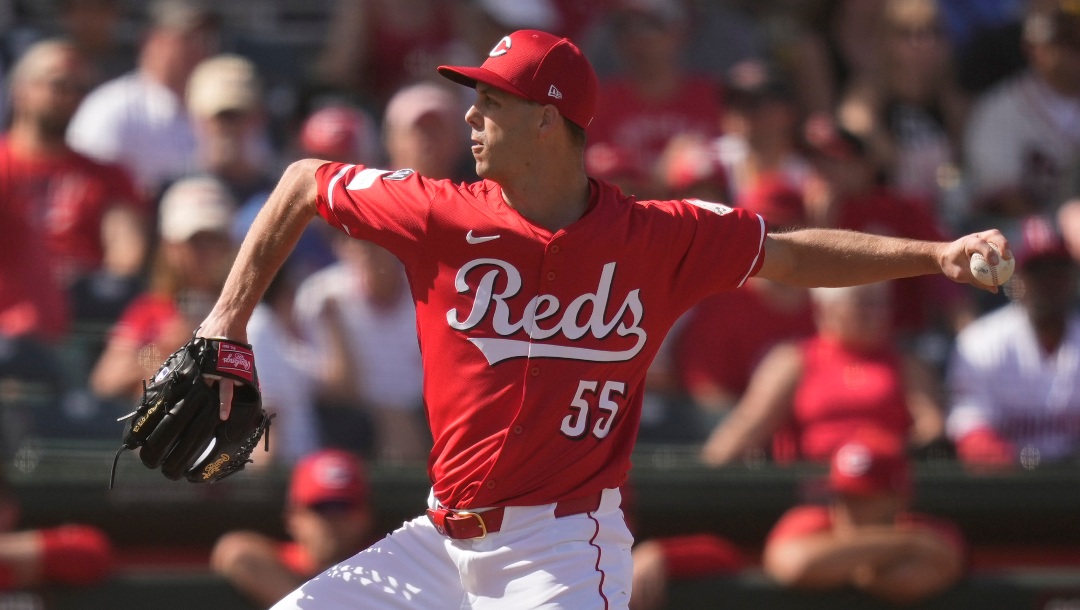 Cincinnati Reds pitcher Taylor Rogers throws during the fifth inning of a spring training baseball game against the San Diego Padres, Saturday, March, 1, 2025, in Goodyear, Ariz. (AP Photo/Carolyn Kaster)