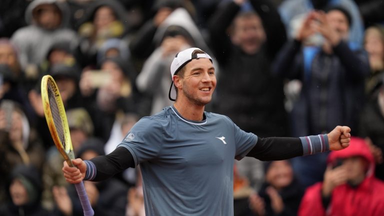 Jan-Lennard Struff of Germany celebrates winning the final match against Taylor Fritz of the United States at the Tennis ATP tournament in Munich, Germany, Sunday, April 21, 2024.
