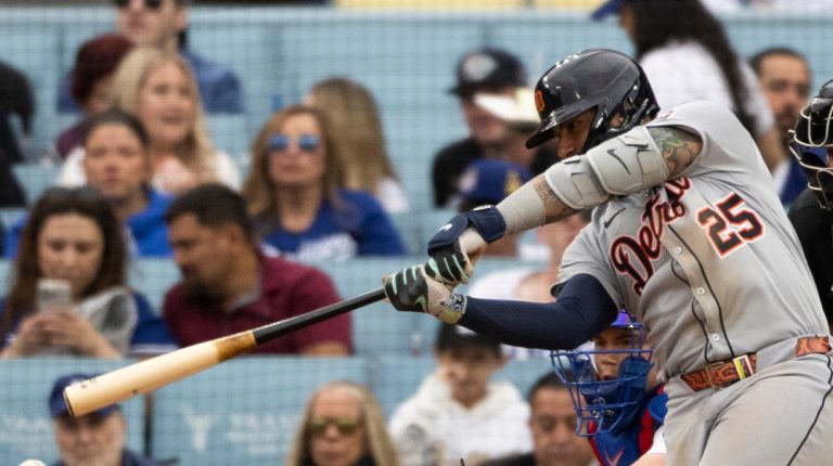 Detroit Tigers' Gleyber Torres (25) bats during the home-opening baseball game against the Los Angeles Dodgers in Los Angeles, Thursday, March 27, 2025. (AP Photo/Kyusung Gong)