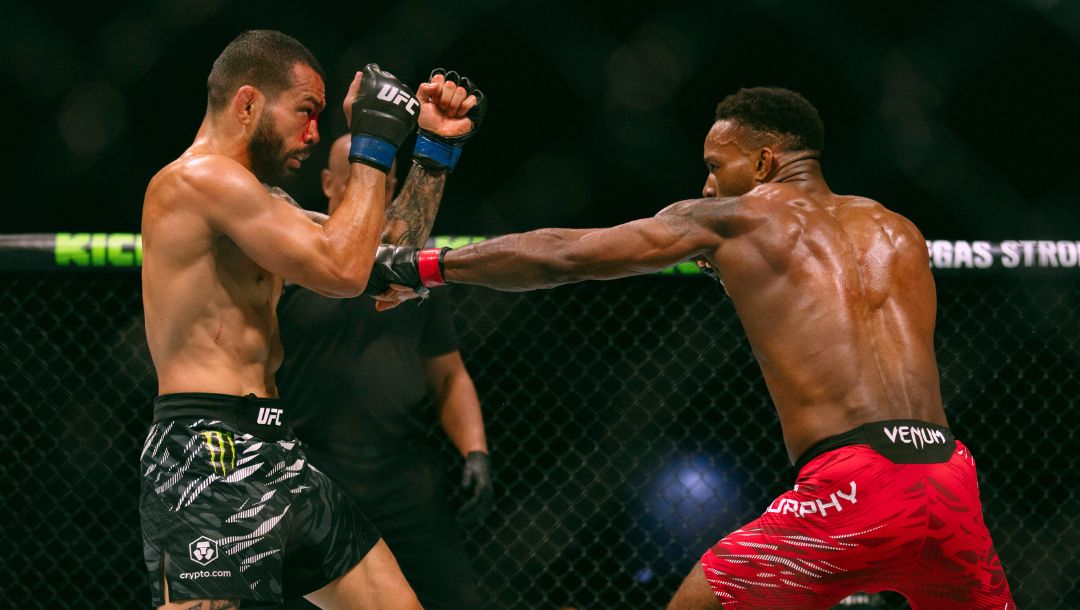 Lerone Murphy, right, fights with Dan Ige during a featherweight mixed martial arts bout at UFC Fight Night on Saturday.