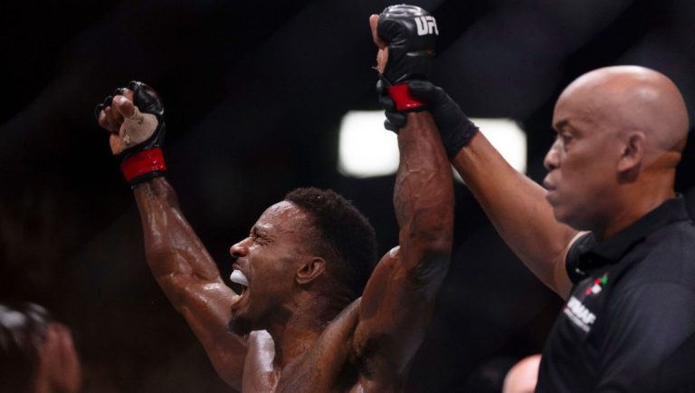 Lerone Murphy, left, celebrates after defeating Dan Ige in a featherweight mixed martial arts bout at UFC Fight Night on Saturday.