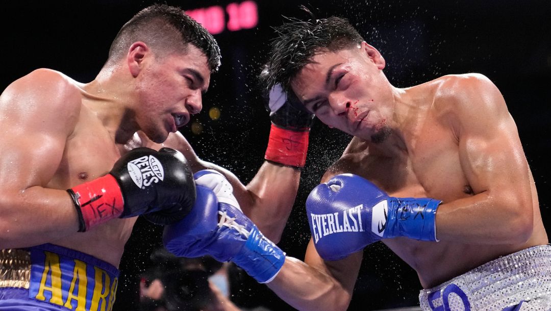 Angelo Leo, right, fights Aaron Alameda during a super bantamweight boxing match Saturday, June 19, 2021, in Houston.