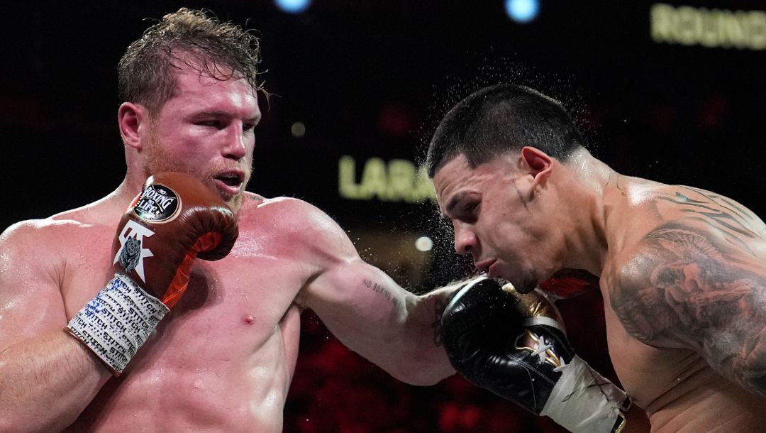 Canelo Alvarez hits Edgar Berlanga in a super middleweight title bout Saturday, Sept. 14, 2024, in Las Vegas.