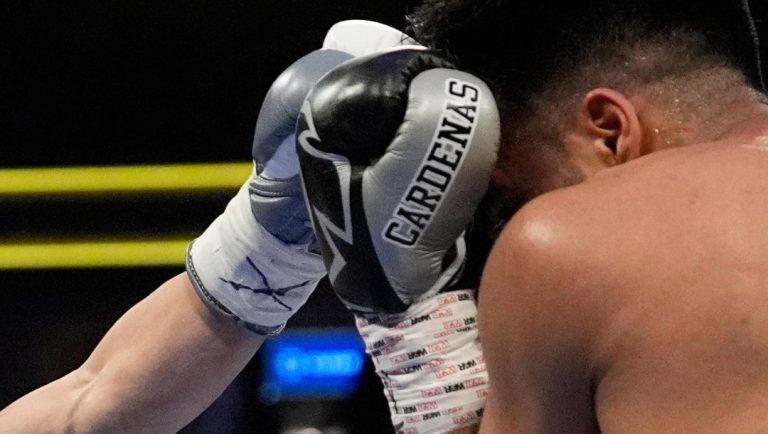 Naoya Inoue, left, fights Ramon Cardenas in a junior featherweight title boxing match Sunday, May 4, 2025, in Las Vegas.