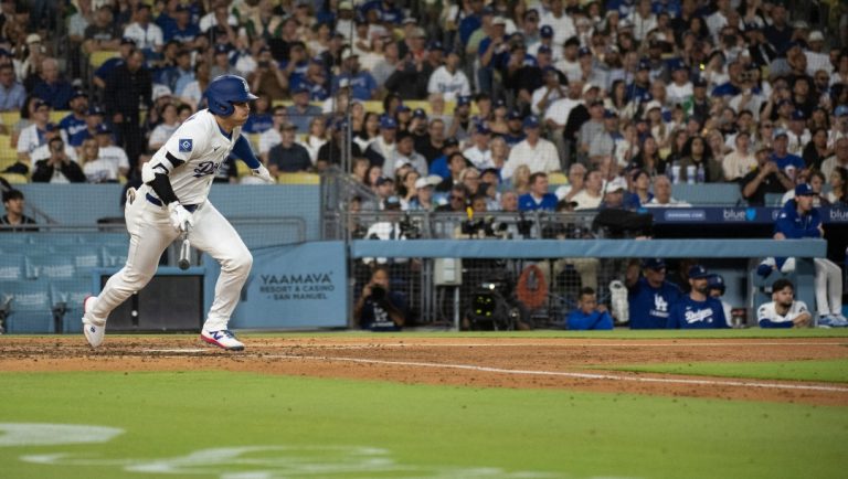 Los Angeles Dodgers' Shohei Ohtani runs after hitting during the sixth inning of a baseball game against the Arizona Diamondbacks in Los Angeles, Tuesday, May 20, 2025.
