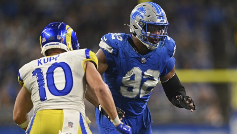 Detroit Lions defensive end Marcus Davenport (92) rushes during the second half of an NFL football game against the Los Angeles Rams, Sept. 8, 2024, in Detroit.