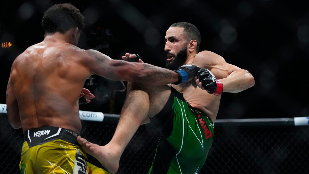 Belal Muhammad, right, during the second round of a welterweight bout against Brazil's Gilbert Burns at the UFC 288.