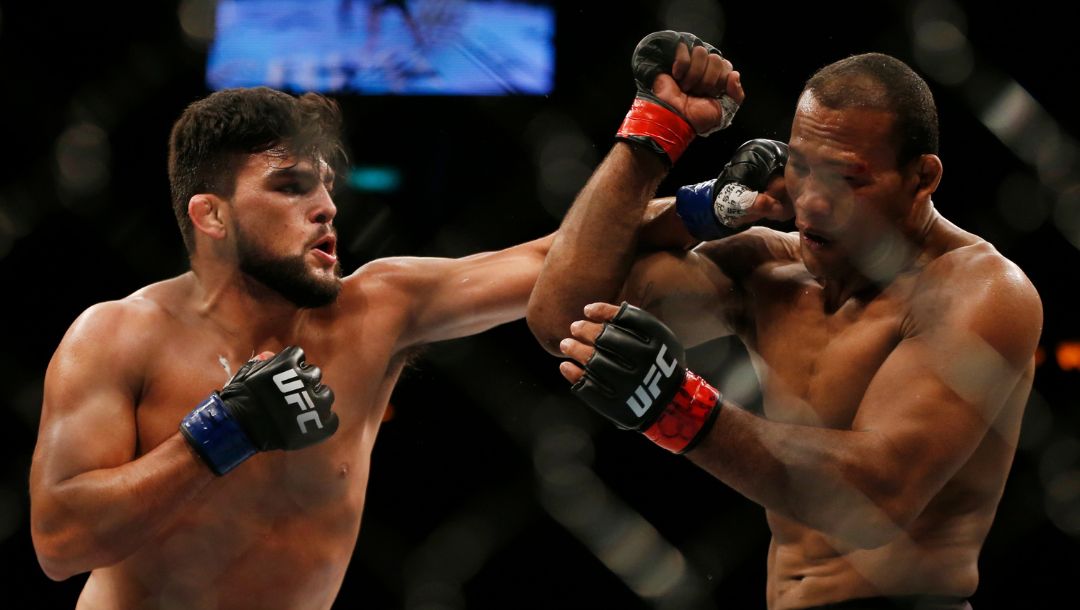 Ronaldo Souza, right, from Brazil, fights Kelvin Gastelum, from the United States, during their UFC middleweight mixed martial arts.
