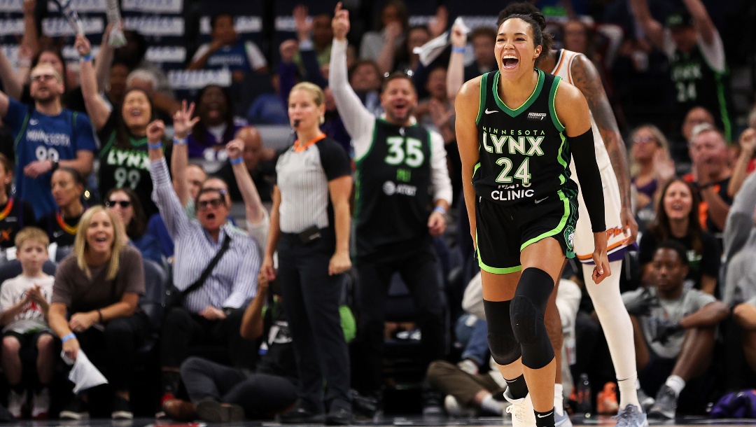 Minnesota Lynx forward Napheesa Collier celebrates her 3-point basket against the Phoenix Mercury during the second half of Game 1 of a WNBA basketball first-round playoff game, Sunday, Sept. 22, 2024, in Minneapolis.