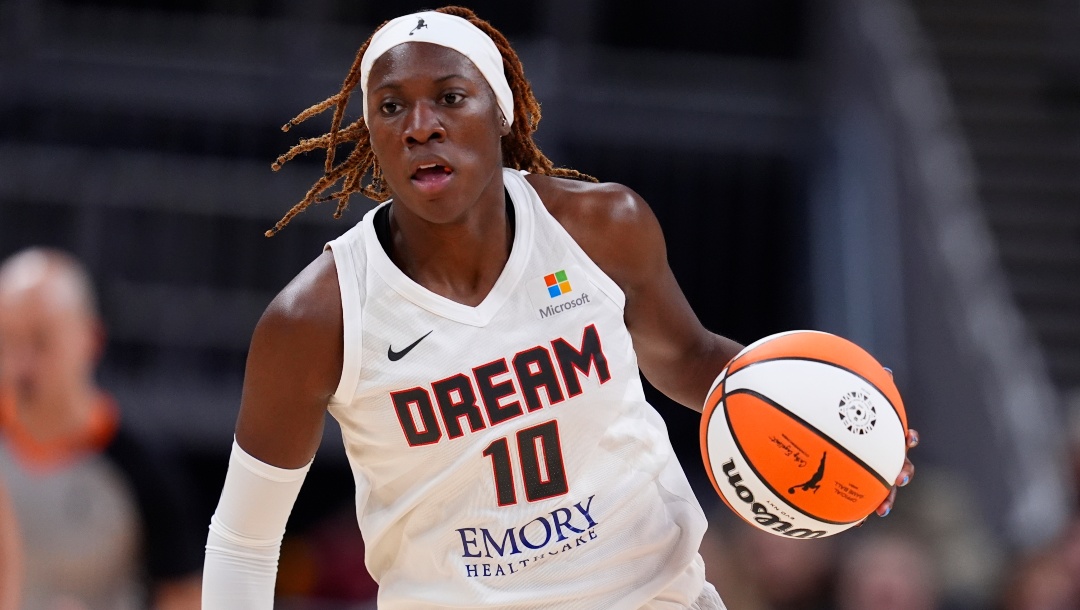 Atlanta Dream's Rhyne Howard dribbles during the first half of an WNBA preseason basketball game against the Indiana Fever, Thursday, May 9, 2024, in Indianapolis.