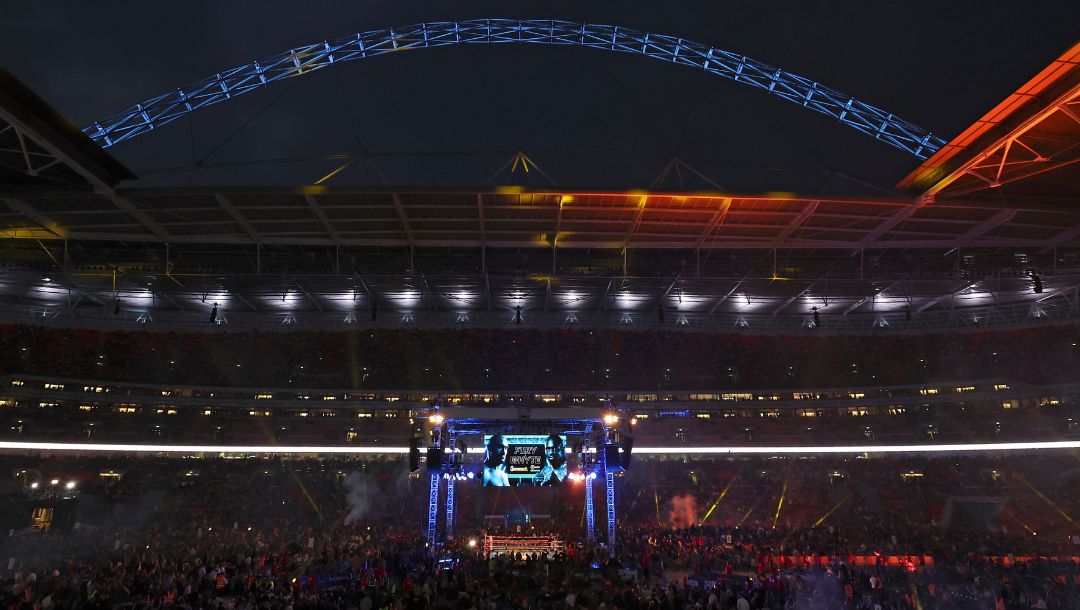 Spectators gather as Britain's Tyson Fury and Britain's Dillian Whyte prepare to enter the ring for a WBC heavyweight title.