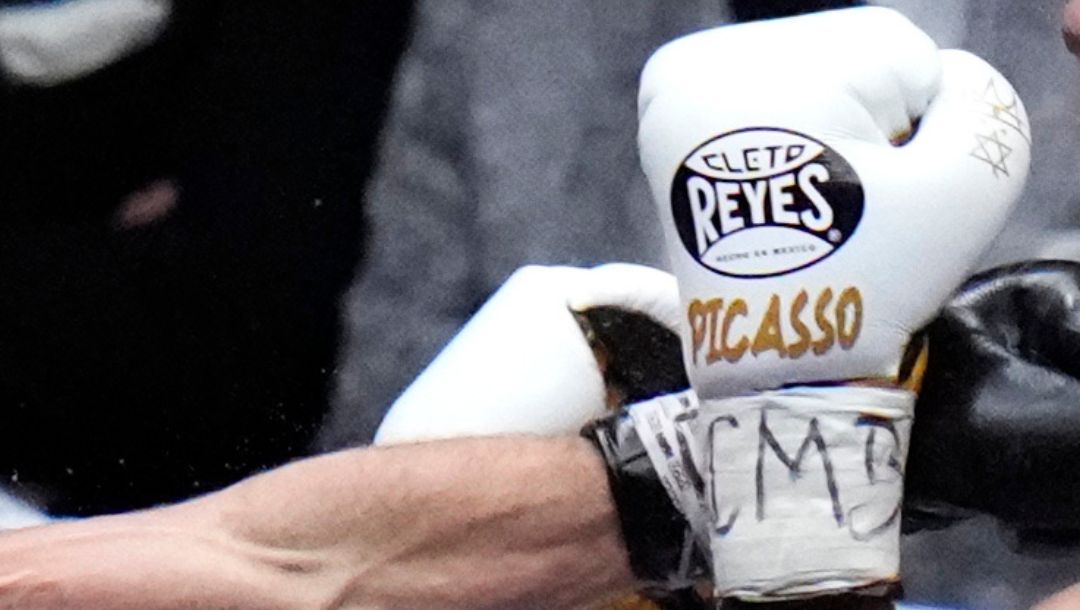 Mexico's David Picasso, right, and Armenia's Azat Hovhannisyan fight during their WBC Super Bantamweight Silver Voluntary boxing.
