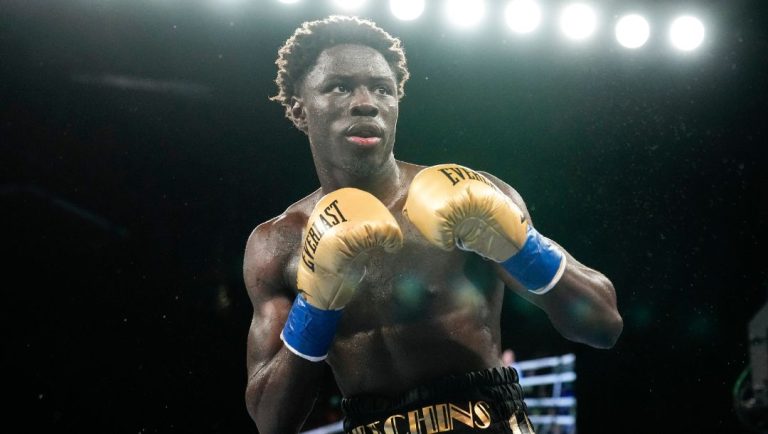 Richardson Hitchins fights John Bauza during the fifth round of a super lightweight championship boxing bout Saturday, Feb. 4.