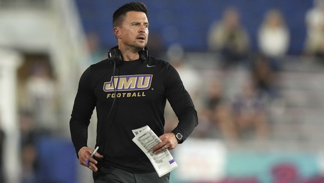 James Madison head coach Bob Chesney watches during the first half of the Boca Raton Bowl NCAA college football game against Western Kentucky, Wednesday, Dec. 18, 2024, in Boca Raton, Fla.